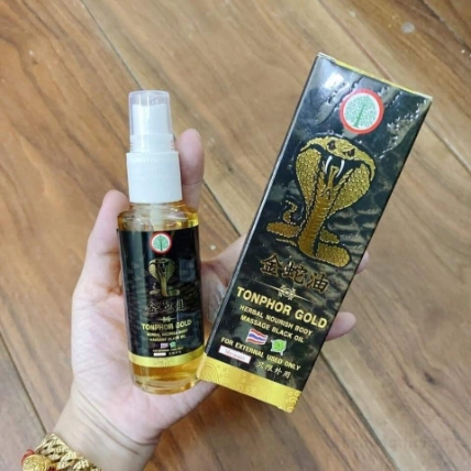 Dầu rắn hổ mang Tonphor Gold Herbal Body Massage Black Oil Thái Lan  ảnh 11